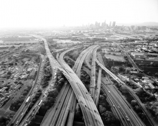 Highways 5, 10, 60, and 101 Looking West, L.A. River and Downtown Beyond, Michael Light, 2004. Pigment print from Los Angeles, 02.12.04 (San Francisco, 2004). The Getty Research Institute, 2653-225. Courtesy the artist and Craig Krull Gallery, Santa Monic