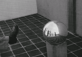 Rosa Rolanda, Untitled [Autophoto with sphere at Casa Luis Barragán, México City], ca. 1950-1955. Archivo Miguel y Rosa Covarrubias. © Rosa Rolanda. Fundación de Arquitectura Tapatía Luis Barragán - Casa Luis Barragán.