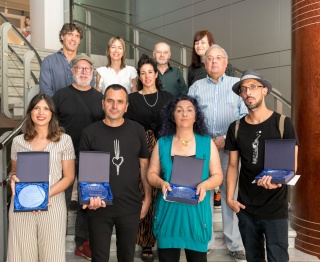 Foto personas ganadoras con jurado
