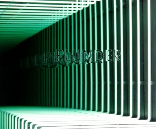 Iván Navarro, "Plunder (Dubai Towers - Doha)," neon, wood, paint, Plexiglass, mirror, one-way mirror and electric energy, 98" x 40.5" x 7", 2011. Courtesy of the artist and Paul Kasmin Gallery, New York. Photo by Mark Markin.