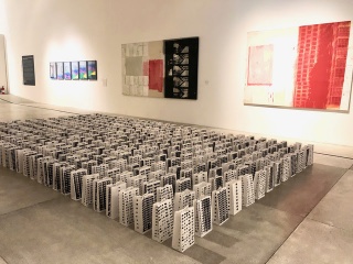 Juan Raul Hoyos, Compound: Installation of 513 recycled paper bags; serigraphy/silk screen painting