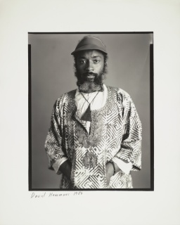 Timothy Greenfield-Sanders. Photograph of David Hammons. 1980. Gelatin silver print, 16 x 20" (40.6 x 50.8 cm). Timothy Greenfield-Sanders “Art World” Collection. The Museum of Modern Art Archives, New York. © 2017 Timothy Greenfield-Sanders
